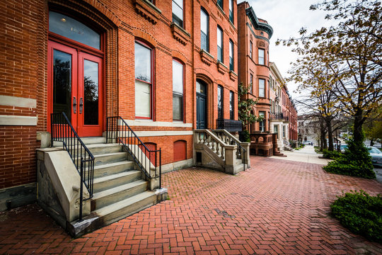 Brick sidewalk and row houses in Bolton Hill, Baltimore, Marylan