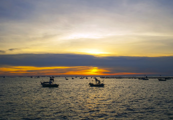 Fototapeta premium Landscape with sunset at the seashore and beautiful sky, Bangpha, Thailand 