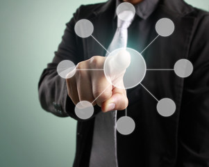 touching virtual  icon of social network.