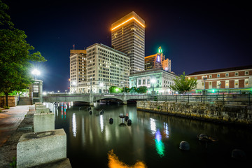 Buildings in downtown and the Providence River at night, in Prov