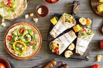 Tortilla with grilled chicken fillet and grilled vegetables