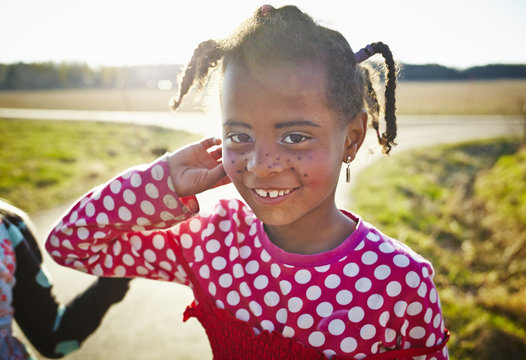 Sweden, Vastra Gotaland, Gullspang, Runnas, Girl (6-7) with painted freckles