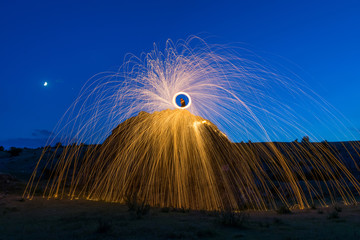 Hot sparks from spinning steel wool