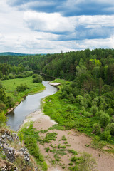 Fototapeta na wymiar landscape with trees and a river in front