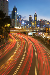 Night traffic and skyline of Hong Kong city at dusk