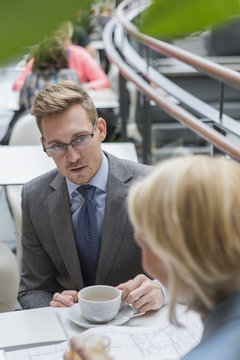 Finland, Helsinki, Businessman at meeting in cafe