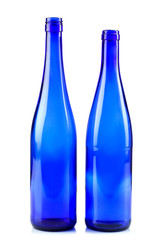blue glass bottles on white isolated background