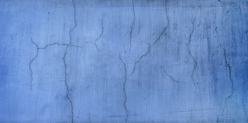 blue vintage plaster wall background with crack