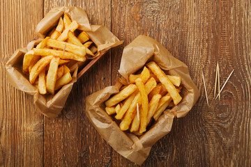Serving Belgian fries served in a paper box. With or without a d