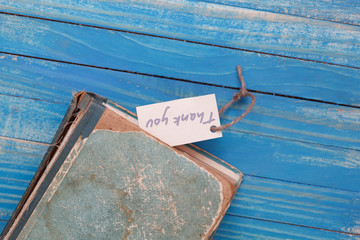 Thank you sign and old book - vintage style
