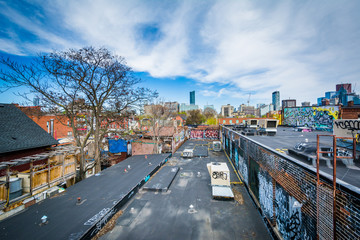 Graffiti on buildings and view over roofs at Kensington Market,