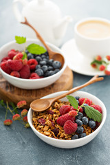 Granola and berries with coffee