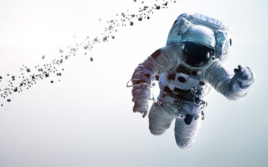 Astronaut in outer space. Spacewalk. Elements of this image furnished by NASA © Vadimsadovski
