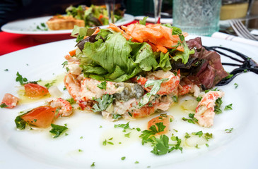 Delicious fresh salad and olive oil