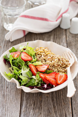 Quinoa salad with strawberries and greens