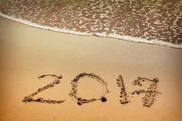 2017, message written in the beach on the sand