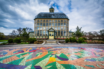 Mural on the ground and the Howard Peters Rawlings Conservatory