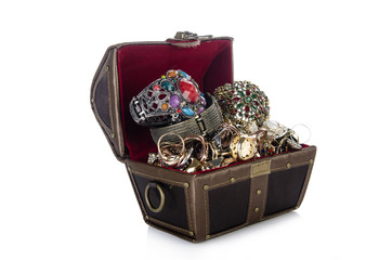 Chest with lots of jewellery isolated on white