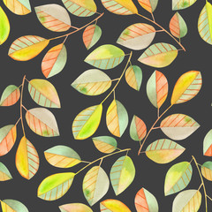 Seamless pattern with the watercolor branches with green and yellow leaves, hand painted isolated on a dark background