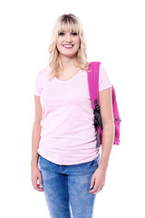 Fototapeta premium Smiling woman with backpack.