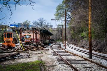 Railroad tracks and abandoned rail cars along Falls Road, in Bal
