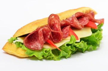 Sandwich with salami cheese, tomato and lettuce