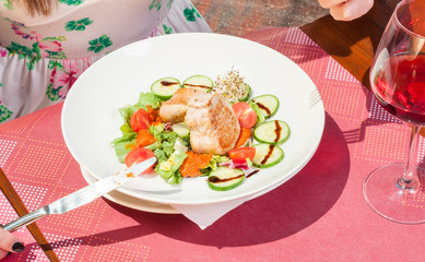 Close-up of lunch dish outside on terrace table