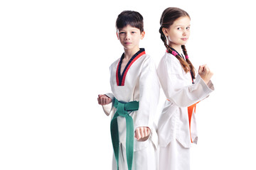 Two children athletes martial art taekwondo training