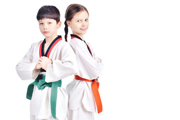 Two children athletes martial art taekwondo training - obrazy, fototapety, plakaty