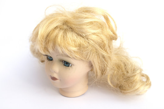 Blonde Girl Doll Head on White Background