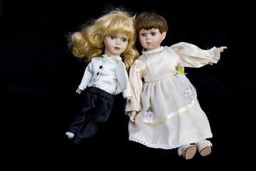 Girl and Boy Doll broken wedding body on black background