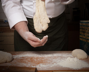 The process of making home bread by male hands