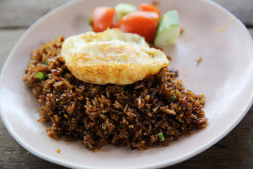 Fried rice nasi goreng with chicken and vegetables