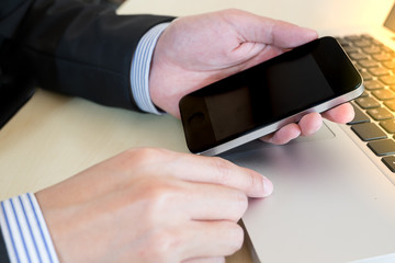 businessman hand on smat phone