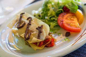 Mille-feuille escalivada  with anchovy in the restaurant from Sp