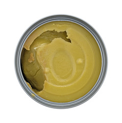 Can of thick green pea soup on a white background top view.