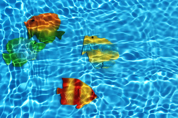 Plastic exotic tropical fish in water