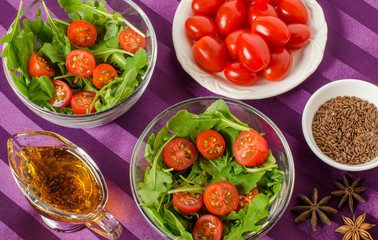 Breakfast for two with salad in salad bowls and Cutlery.