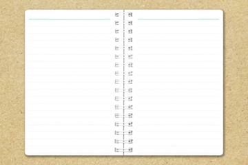 Blank notebook page on brown recycled paper. Notebook empty page white copy space for text or image.
