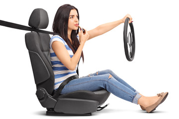 Woman driving and putting on lipstick