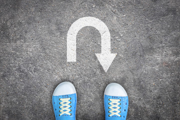 Blue shoes standing at u-turn point