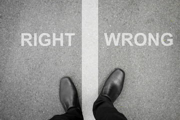 Black shoes standing between right and wrong