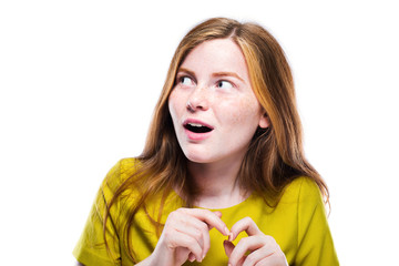 Portrait of wondering young girl isolated on white background