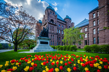 Tulips and statue outside the Legislative Assembly of Ontario, i