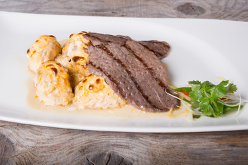 Grilled beef steak with mushrooms