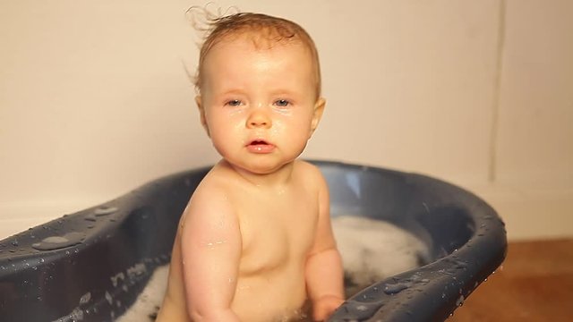 cute little baby in a bathtub