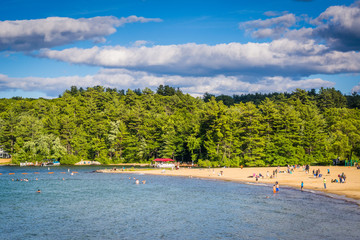 View of Endicott Rock Park Beach along Lake Winnipesaukee in Wei