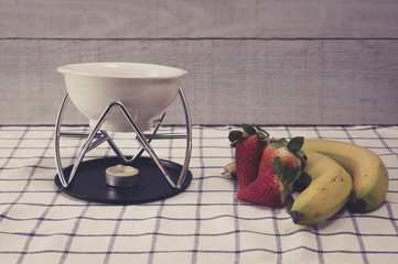 Strawberries and bananas for a chocolate fondue