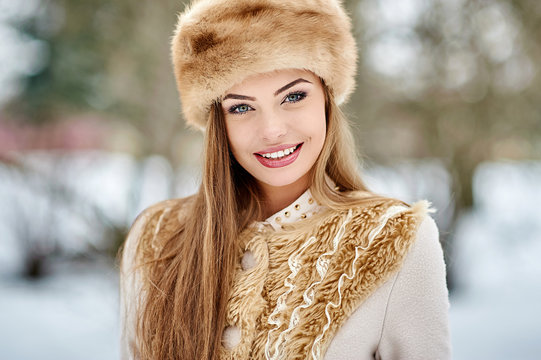 Beautiful pretty girl in winter clothes