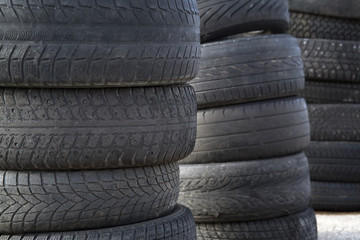 Erased automobile tires background. Structure of a tread of rubber.